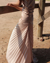 Velvet pleated one-shoulder gown with ruched waist and flowing asymmetric hemline